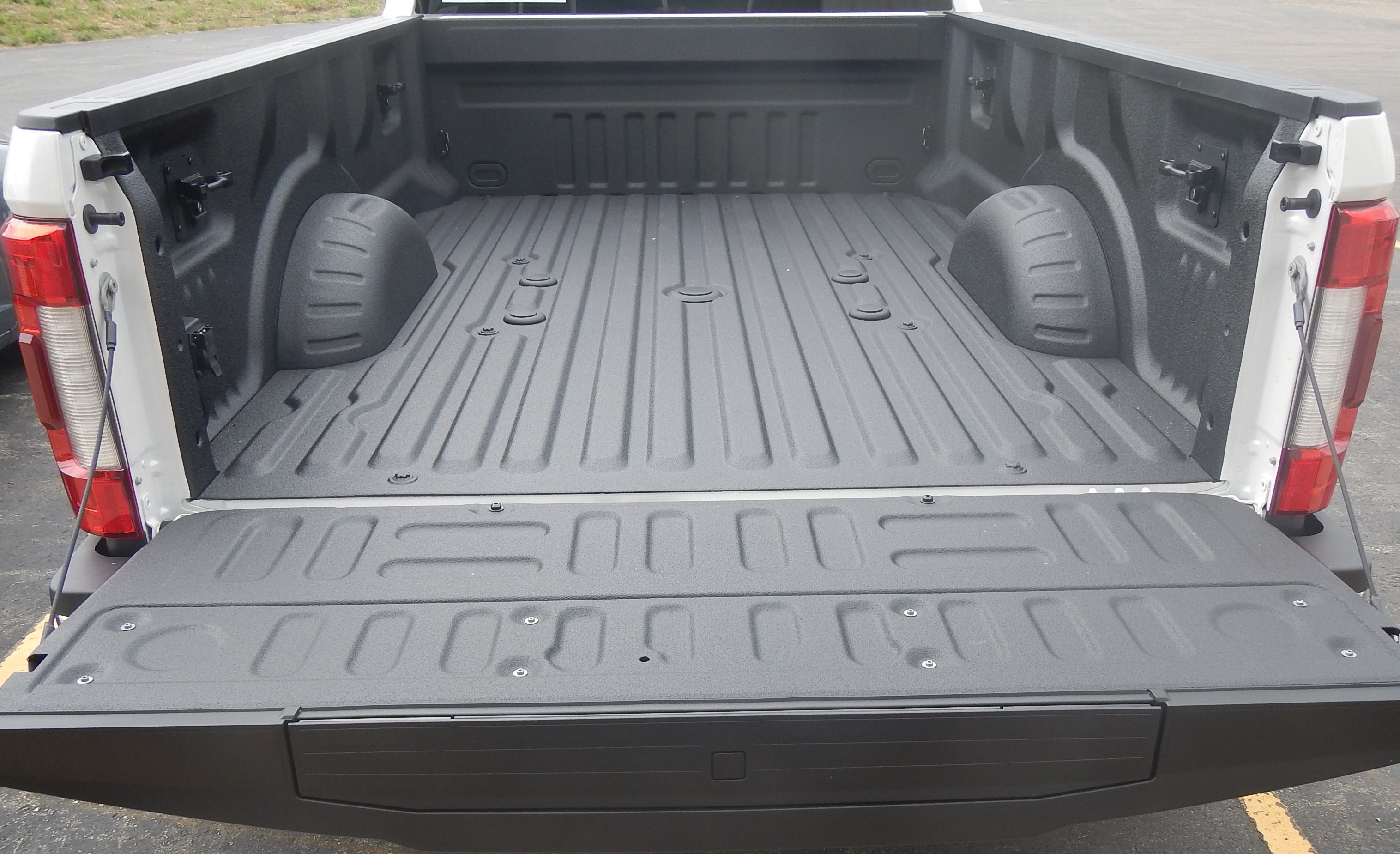 Completed underbody and bed coating work on a truck